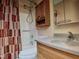 The bathroom features a tub, shower, and modern vanity at 22 Woodridge Ln, Cameron, NC 28326