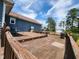 Large weathered wooden deck off the back of a blue home at 22 Woodridge Ln, Cameron, NC 28326