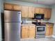 Well-equipped kitchen with stainless steel appliances and ample cabinet space at 22 Woodridge Ln, Cameron, NC 28326