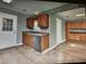 Well-lit kitchen featuring stainless steel appliances and lots of cabinet space at 22 Woodridge Ln, Cameron, NC 28326