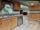 Open kitchen featuring updated appliances and adjacent dining area at 22 Woodridge Ln, Cameron, NC 28326