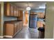 Lovely kitchen with a stainless steel refrigerator and lots of cabinet space at 22 Woodridge Ln, Cameron, NC 28326
