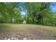 Spacious backyard with a storage shed at 2453 Derby Dr, Raleigh, NC 27610