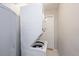 Laundry room showcasing a stackable washer and dryer at 2453 Derby Dr, Raleigh, NC 27610