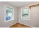 Cozy room with natural light, featuring wood flooring and a convenient clothing rack at 2453 Derby Dr, Raleigh, NC 27610