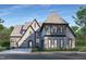 Beautiful two-story brick home boasting manicured landscaping and architectural roof at 2709 Rothgeb Dr, Raleigh, NC 27609