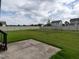 Spacious backyard with vinyl fence and small patio at 30 Imperial Dr, Clayton, NC 27527