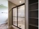 Modern bathroom with a glass shower and tile floor at 30 Imperial Dr, Clayton, NC 27527