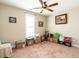 Bedroom with neutral paint, carpet, window, ceiling fan and room for storage at 30 Imperial Dr, Clayton, NC 27527