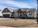 Charming single-story home with an attached two-car garage and manicured front yard at 30 Imperial Dr, Clayton, NC 27527