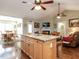 Spacious open kitchen with a granite island connects to the dining and living areas at 30 Imperial Dr, Clayton, NC 27527