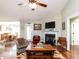 Inviting living room with fireplace and an open layout to the dining area, great for entertaining at 30 Imperial Dr, Clayton, NC 27527