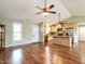 Open-concept living area with an eat-in kitchen and hardwood floors at 30 Imperial Dr, Clayton, NC 27527