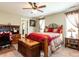 Cozy bedroom with a comfortable bed, side table, and a well-lit interior at 30 Imperial Dr, Clayton, NC 27527