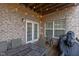 Outdoor patio area with seating, lighting and access to home at 3003 Weston Green Loop, Cary, NC 27513