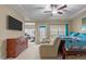 Comfortable main bedroom with a sitting area and ensuite bathroom at 3003 Weston Green Loop, Cary, NC 27513