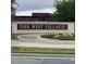 Community entrance sign for Park West Village, surrounded by well-maintained landscaping at 3003 Weston Green Loop, Cary, NC 27513