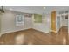 Bright living room with hardwood floors, recessed lighting, and seamless transition to the outdoor deck at 305 November St, Garner, NC 27529