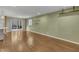 Open living room boasts hardwood floors, recessed lighting, and seamless transition to the outdoor deck at 305 November St, Garner, NC 27529