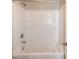 A bathtub and shower combination, with a tile surround at 309 Mainline Sta, Morrisville, NC 27560