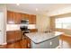 Shows kitchen with stainless steel appliances, granite countertops, and pendant lighting at 309 Mainline Sta, Morrisville, NC 27560