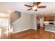 Open concept living room with hardwood floors that lead to a modern kitchen at 309 Mainline Sta, Morrisville, NC 27560