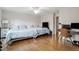 Spacious bedroom with hardwood floors, desk, and two beds at 318 Mccauley St # 2, Chapel Hill, NC 27516