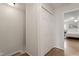 Hallway with closet and hardwood flooring leading to a bedroom at 318 Mccauley St # 2, Chapel Hill, NC 27516