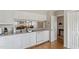 Well-lit kitchen showcases modern appliances and a convenient pass-through to the living area at 318 Mccauley St # 2, Chapel Hill, NC 27516