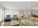 Comfortable living room featuring a fireplace and an arrangement of cozy armchairs and a sofa at 318 Mccauley St # 2, Chapel Hill, NC 27516