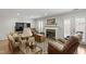 Comfortable living room featuring a fireplace, large-screen TV, and ample seating at 318 Mccauley St # 2, Chapel Hill, NC 27516