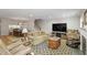 Inviting living room with a large-screen TV, fireplace, and comfortable seating at 318 Mccauley St # 2, Chapel Hill, NC 27516