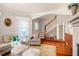 Welcoming entryway that leads to a staircase and into the main living spaces at 319 W Margaret Ln, Hillsborough, NC 27278