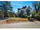 Charming two-story home with screened in porch on a lush lawn at 319 W Margaret Ln, Hillsborough, NC 27278