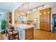 Spacious kitchen with tile flooring, breakfast bar, and open layout at 319 W Margaret Ln, Hillsborough, NC 27278