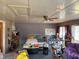 View of bedroom with a ceiling fan and a window with natural light at 322 Blackstone Rd, Sanford, NC 27330