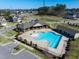 Aerial view of a large pool and clubhouse in a residential community at 3460 Willow Green Dr, Apex, NC 27502