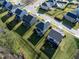 An aerial view of a home with a fenced in yard in a vibrant residential area at 3460 Willow Green Dr, Apex, NC 27502