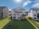 Large backyard showcasing a well-manicured lawn, a fence, and a spacious deck perfect for outdoor enjoyment at 3460 Willow Green Dr, Apex, NC 27502