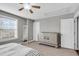Bedroom with an accent mirror, ceiling fan, and natural light from the window at 3460 Willow Green Dr, Apex, NC 27502