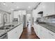 Gourmet kitchen with granite countertops, stainless appliances, and ample counter space for cooking at 3460 Willow Green Dr, Apex, NC 27502