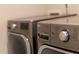 Close up shot of a gray LG washer and dryer with multiple washing and drying options at 3460 Willow Green Dr, Apex, NC 27502