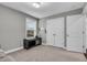 The living room has a storage console, natural light and neutral walls at 3460 Willow Green Dr, Apex, NC 27502