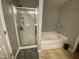Bathroom with a shower and soaking tub at 401 Lawton Dr, Haw River, NC 27258