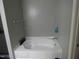 Bathroom features a nice, clean, bright, white soaking tub at 401 Lawton Dr, Haw River, NC 27258