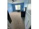 ' blue bedroom with a black desk and polka dots on the wall at 401 Lawton Dr, Haw River, NC 27258