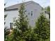A beautiful backyard view of the home's siding at 401 Lawton Dr, Haw River, NC 27258
