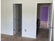 Hallway showing two door openings and base trim at 401 Lawton Dr, Haw River, NC 27258