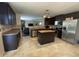 Well-equipped kitchen with stainless steel appliances and a central island at 401 Lawton Dr, Haw River, NC 27258