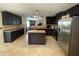 Lovely kitchen featuring stainless steel appliances and dark wood cabinetry at 401 Lawton Dr, Haw River, NC 27258